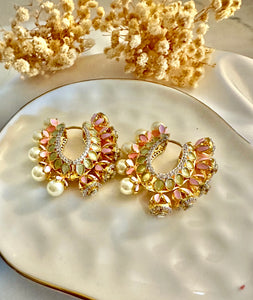 Pink hoop earrings with pearl setting