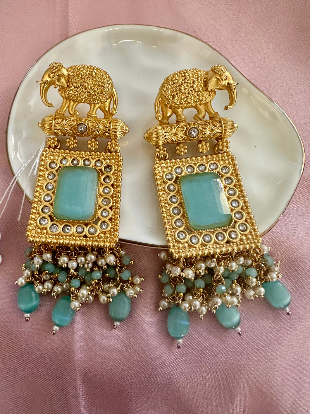 Aqua blue elephant motif earrings